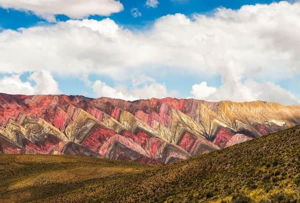 Red, ochre and green mineral stripes of Rainbow Mountain (Vinicunca), Cusco
