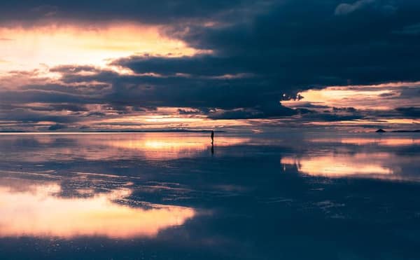 Uyuni Salt Flat turned into a water mirror reflecting the sky